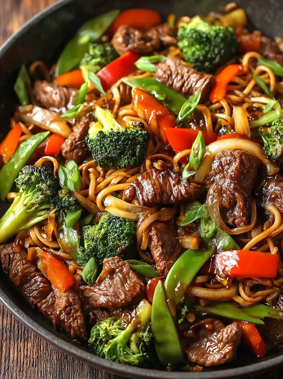 Sizzling Blackstone Beef Stir Fry with Crisp Vegetables and Savory Garlic Ginger Sauce